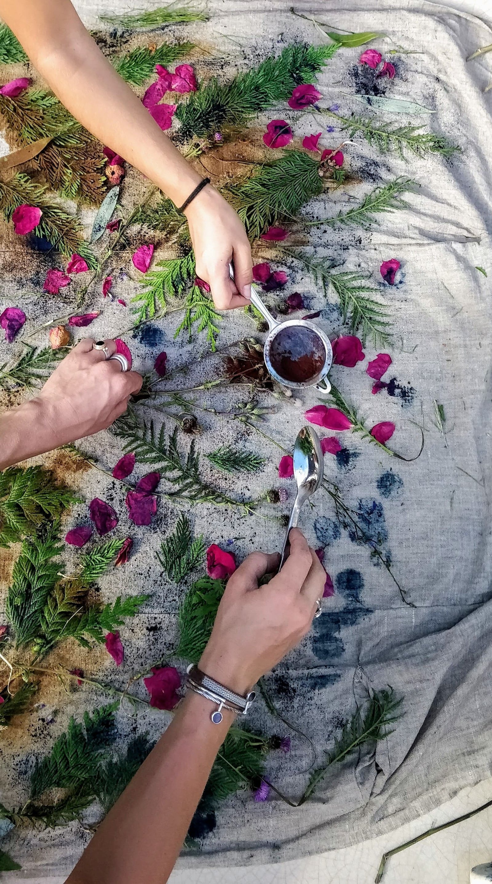 My hands and Hermès' mother's hands, playing with ephemeral beauty